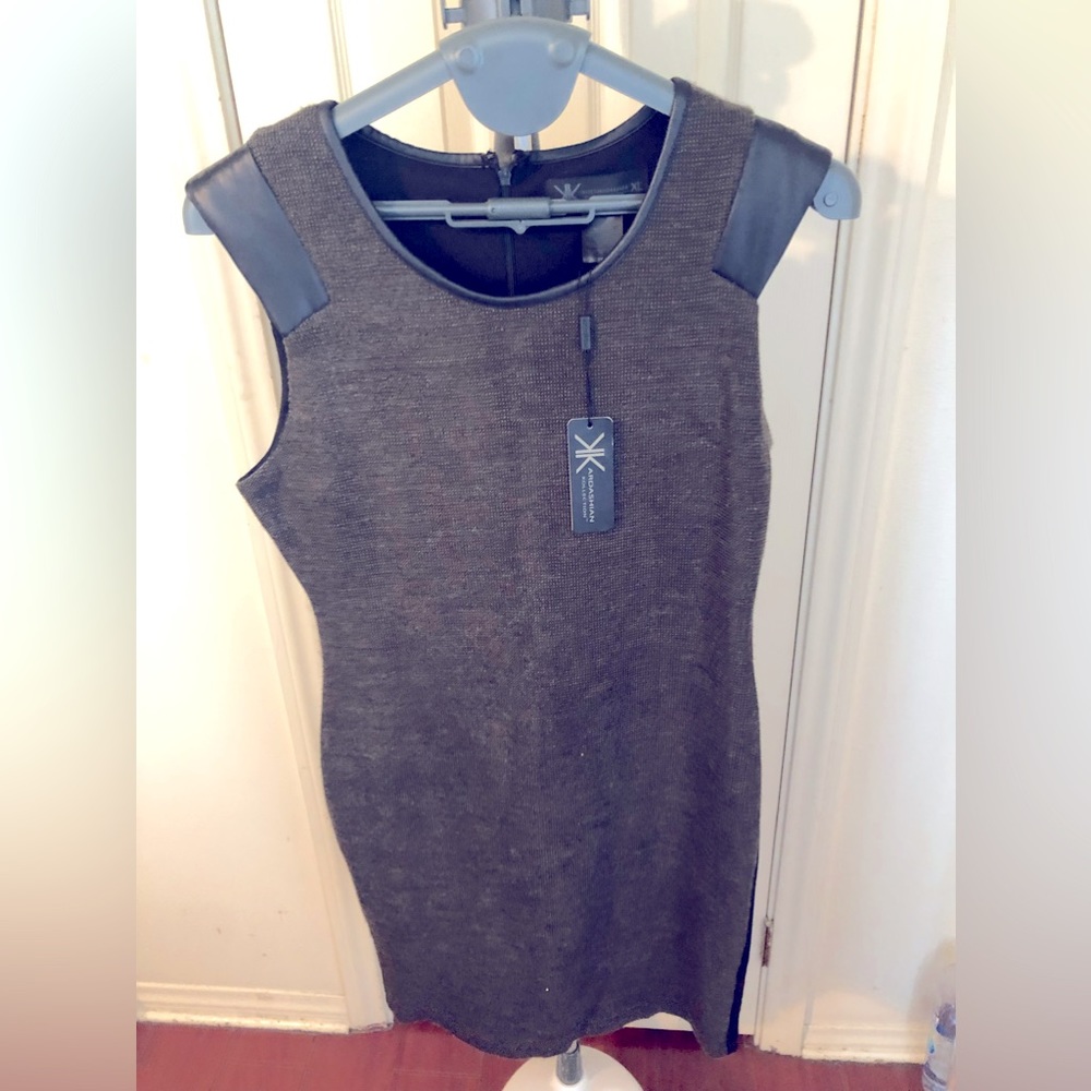 Black and Brown body-con with Faux Leather on Collar and Sleeves.